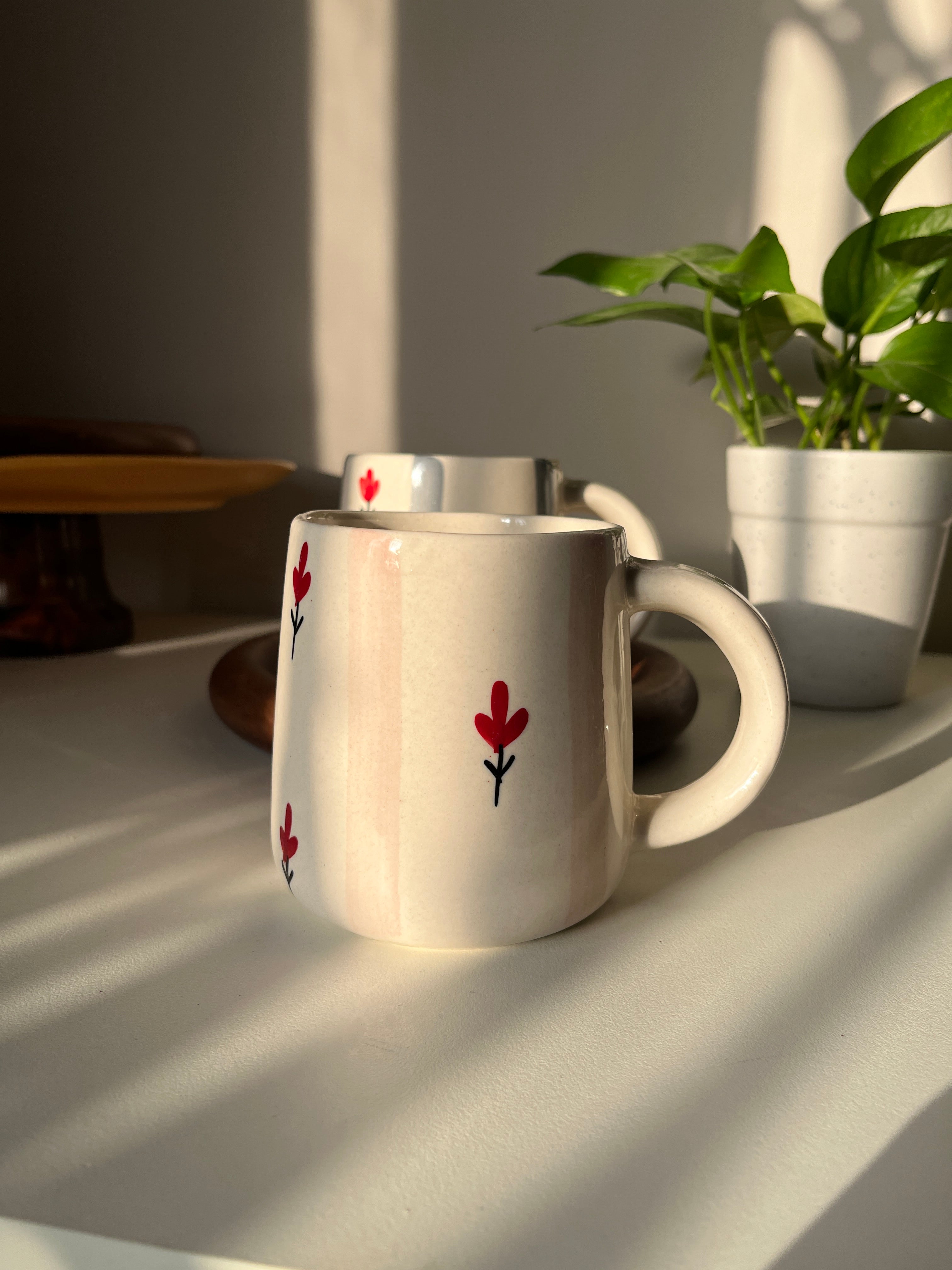 Pink stripe on white base with red floral motif ceramic mug for coffee, tea and breaks. Home decor, collector. 
