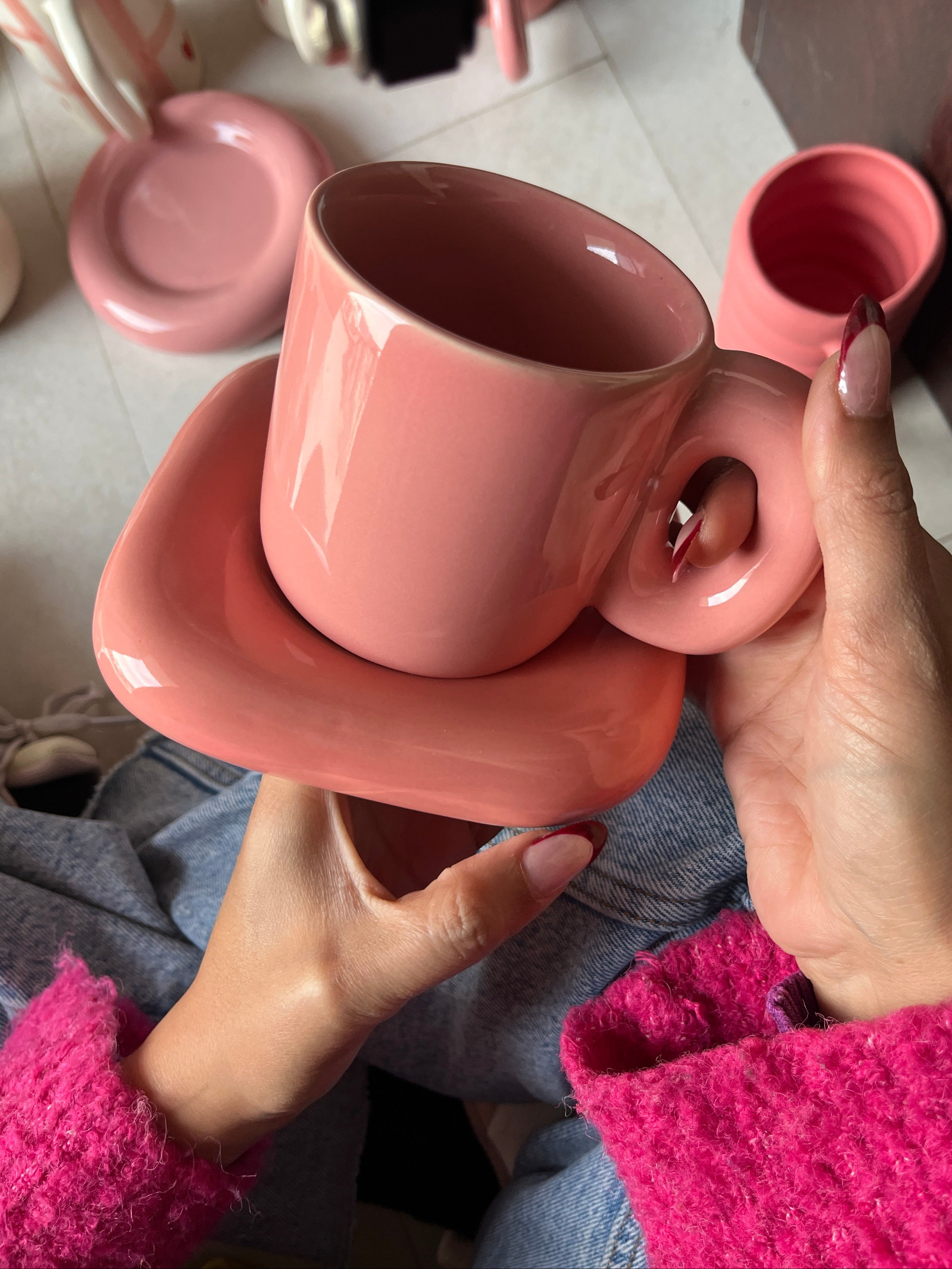 Chunky pink monotone mug and saucer. ceramic saucer is square shape.
