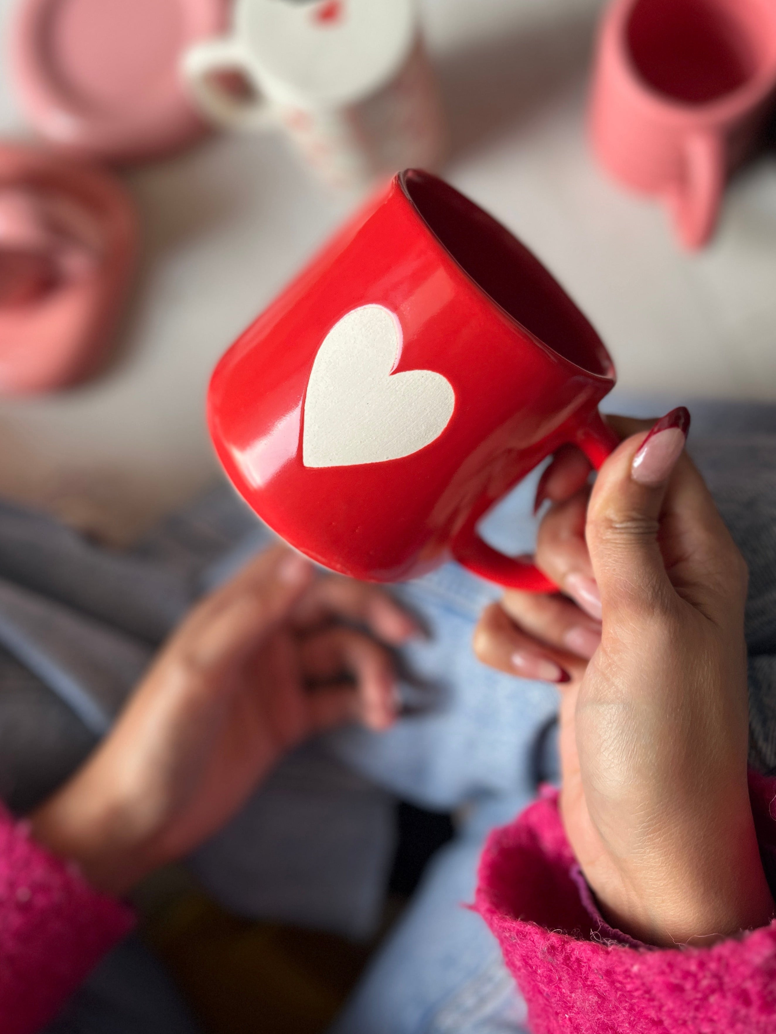 Red mug with white matte heart,