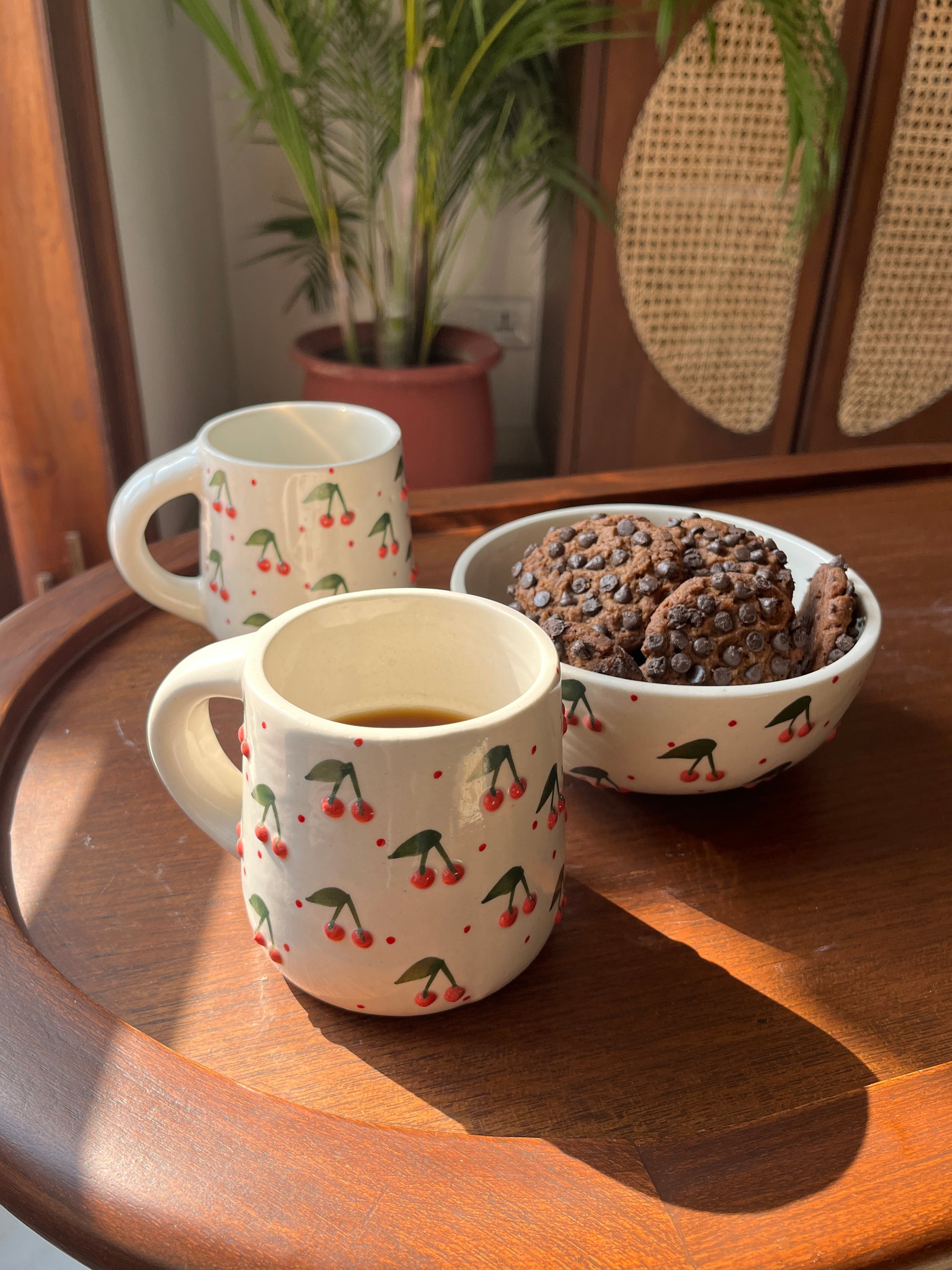 Berry Berry mug and bowl set styled for breakfast and coffee moments.