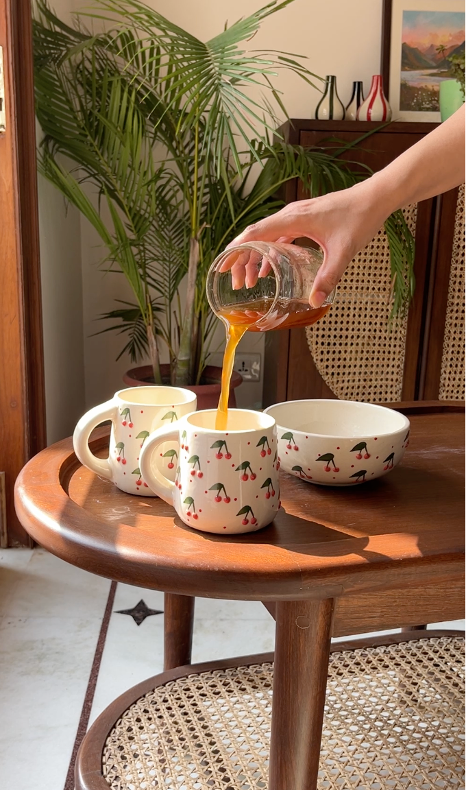 Berry Berry mug and bowl set used for serving coffee, tea, and snacks.