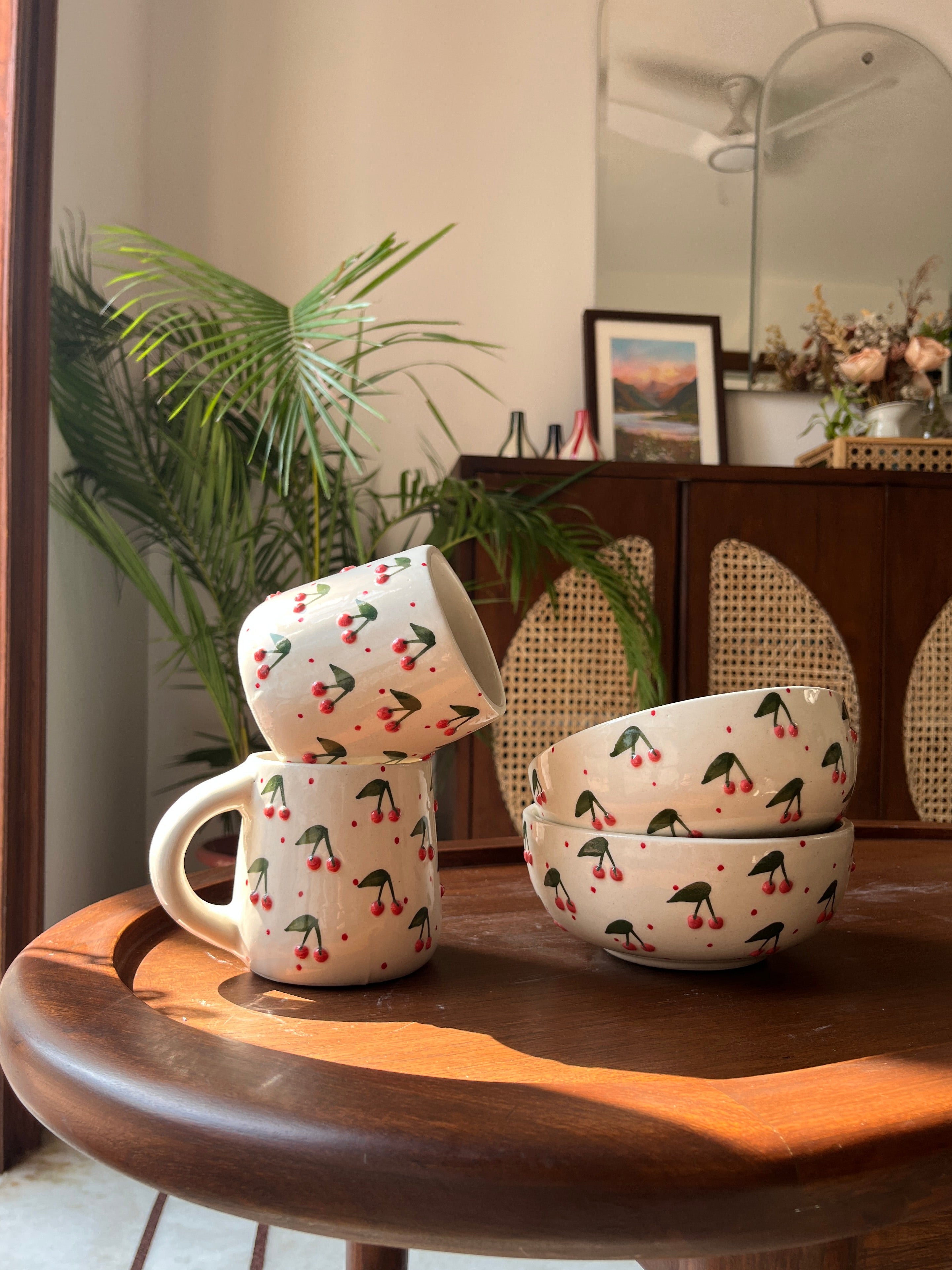 Berry Berry Mug and Bowl Set featuring two ceramic mugs and two matching ceramic bowls.