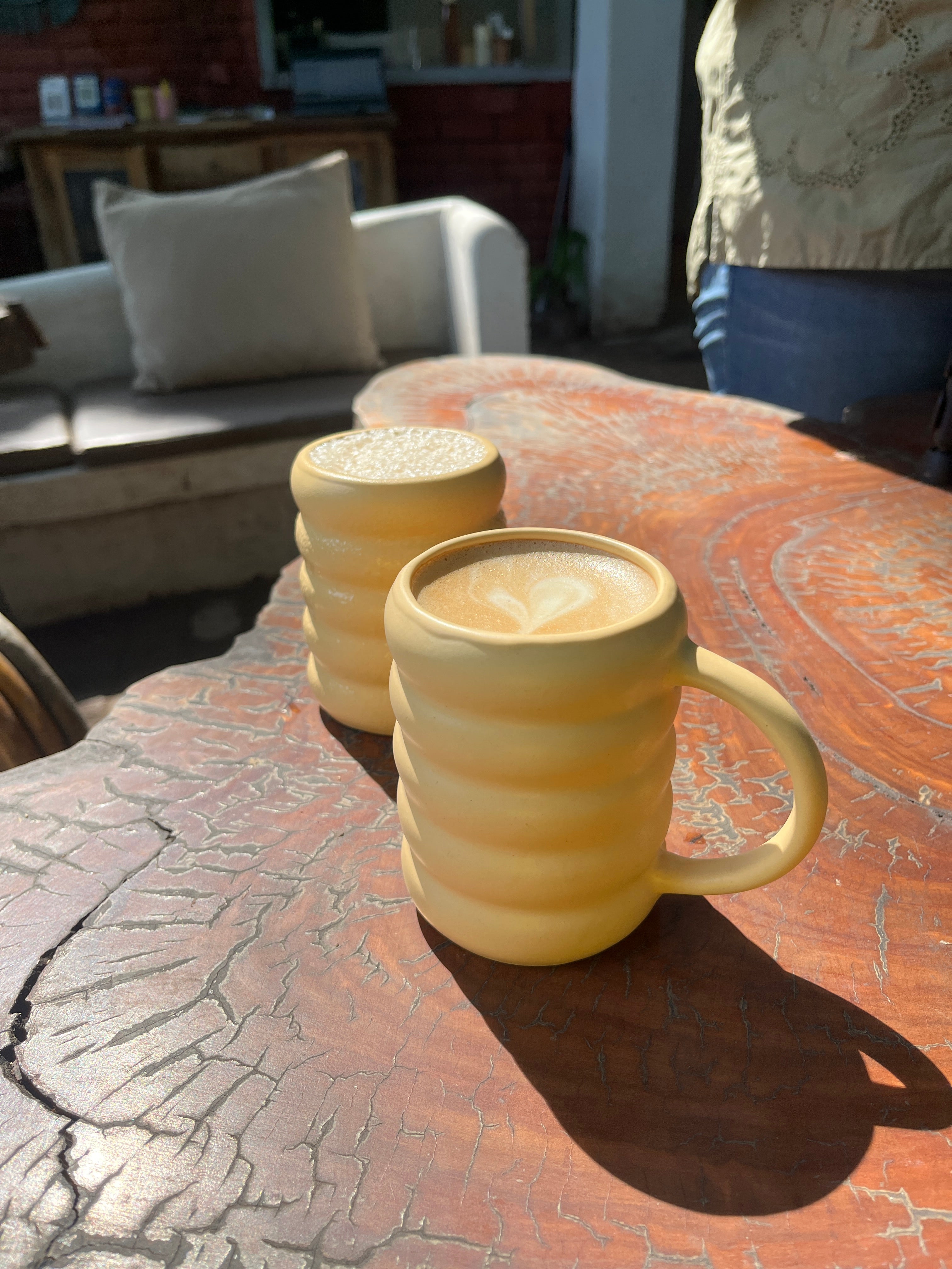 Minimal yellow ceramic mug with smooth matte finish