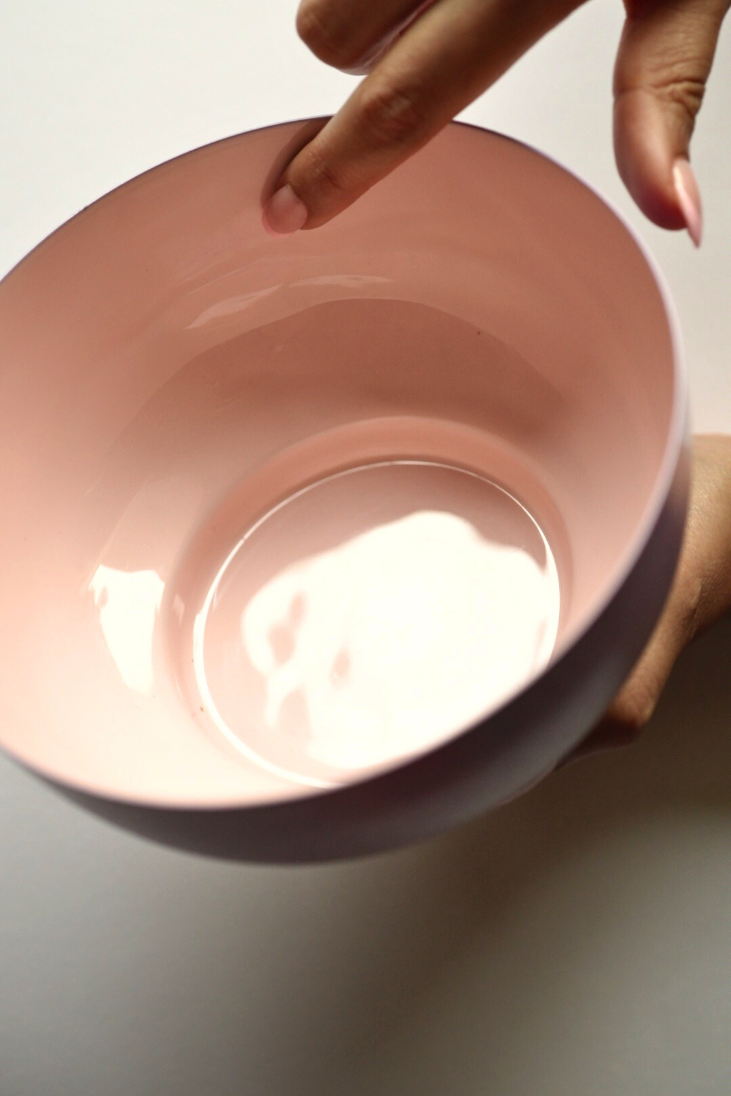 Bon Bon metal fruit bowl in pink and lavender with enamel finish