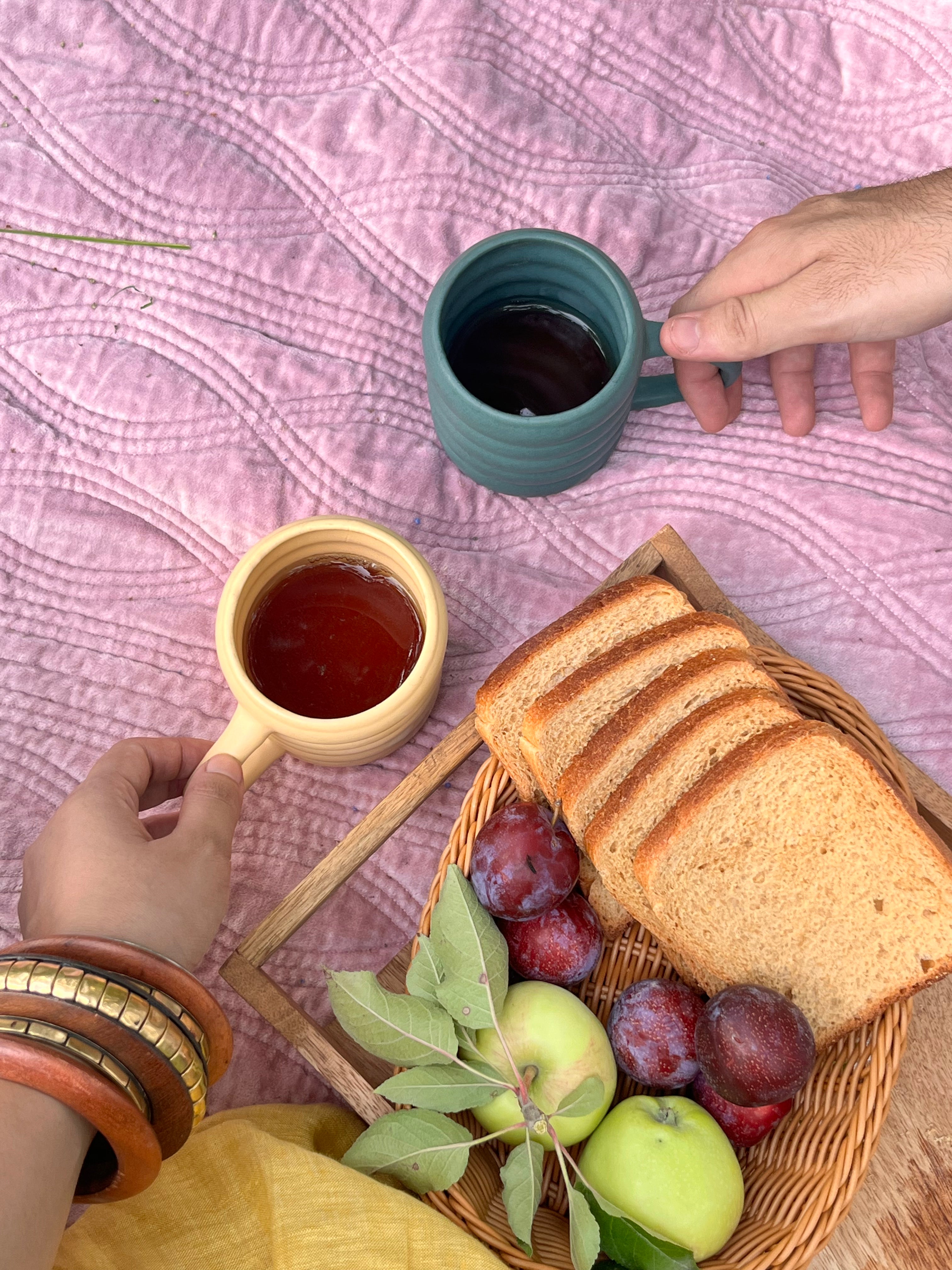 Buttercup ceramic mug styled on a cosy picnic blanket, outdoorsy but perfect for soft home vibes