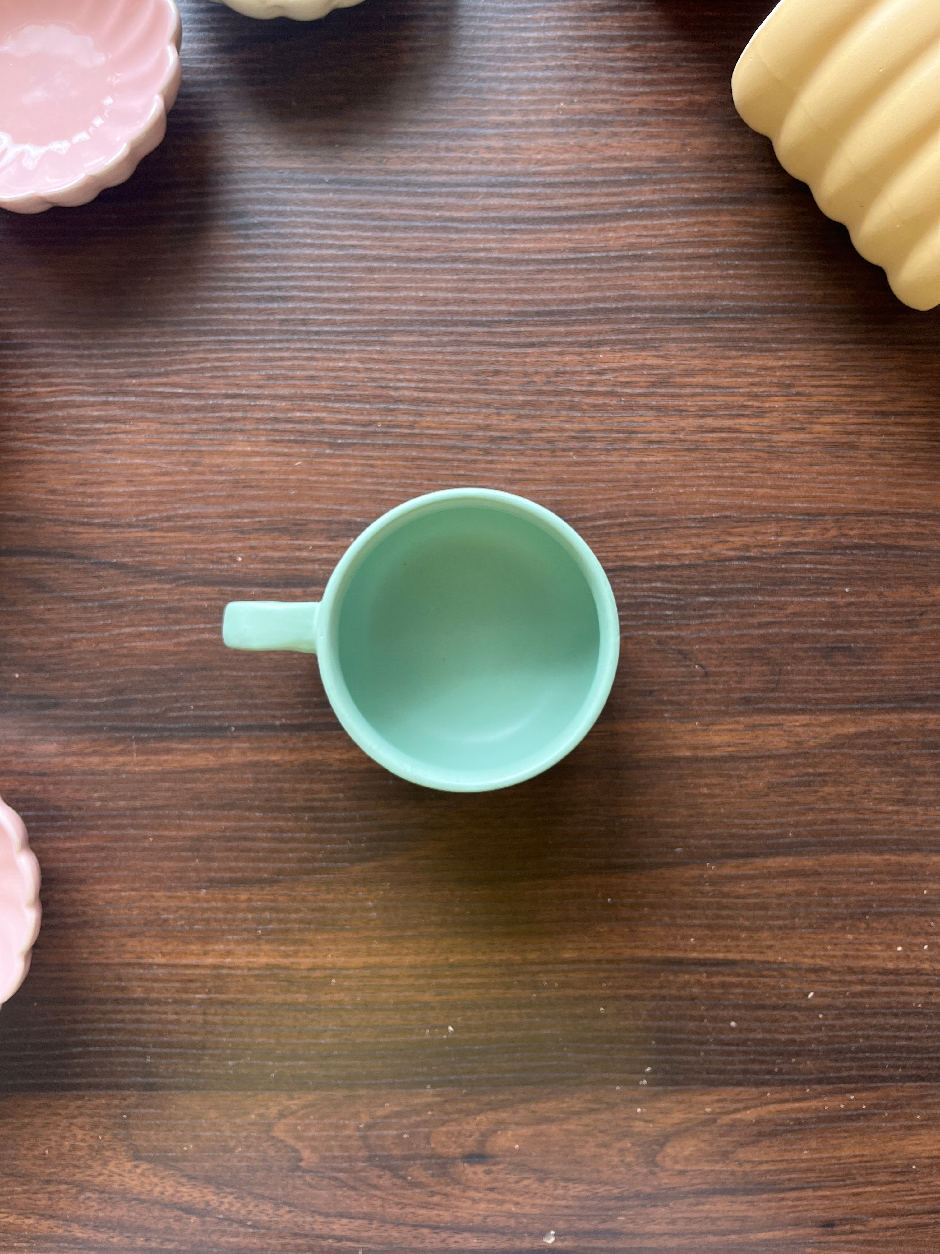 Pastel green ceramic cup for everyday sipping