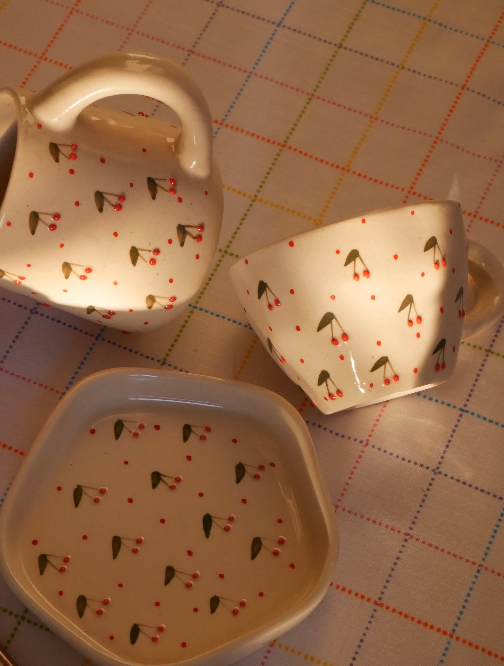 Hand-painted Cherry On Top ceramic cup and saucer with cherry motifs