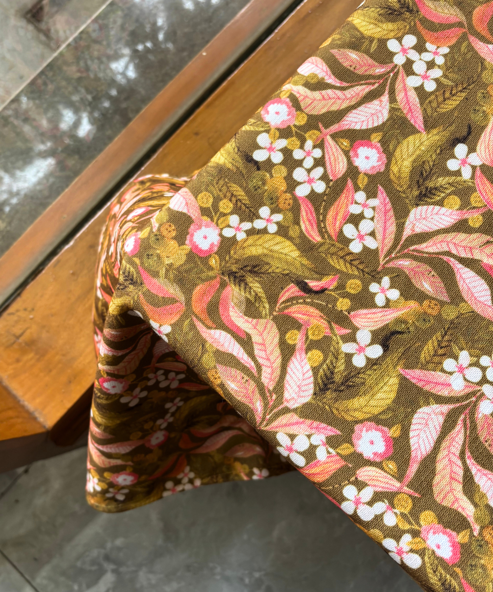 Close-up of botanical print on Folklore tablecover