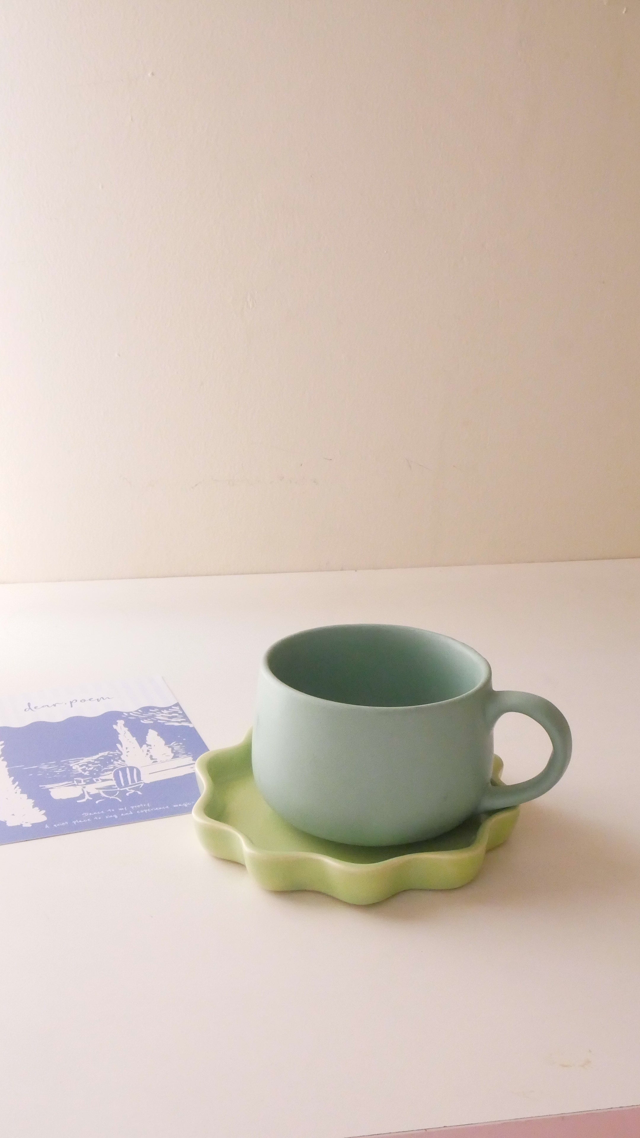 Green Tulip ceramic cup in pastel green finish