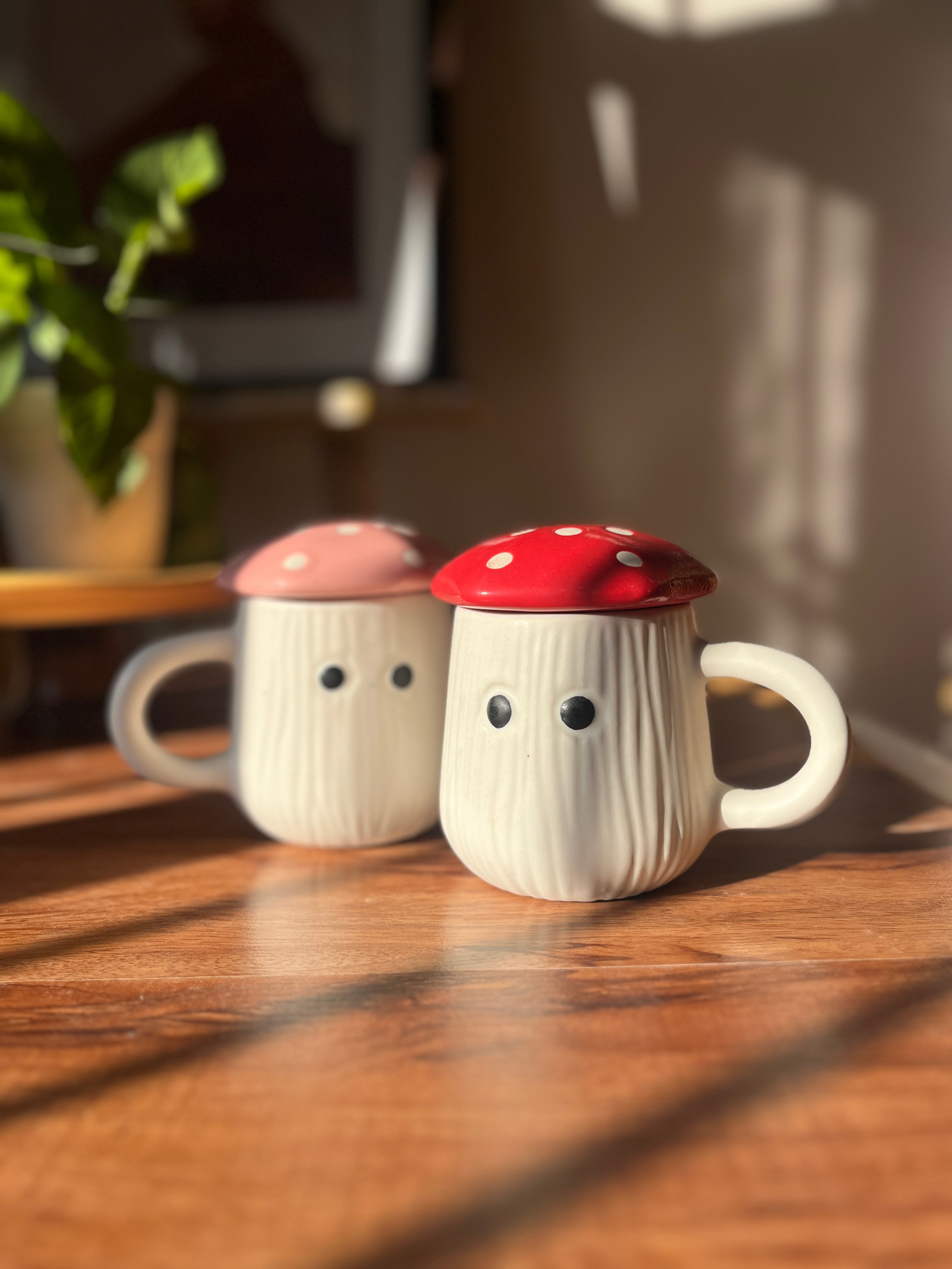 Shroommates ceramic mug duo featuring Shroom and Shroomlet with colourful mushroom lids.